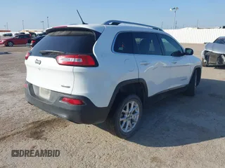 2018 Jeep Cherokee Latitude with VIN 1C4PJLCB2JD511083, listed as a IAAI auction lot 42070152 with 135,752 mi miles. Bid and sale history available at carsss.com. Image 4.
