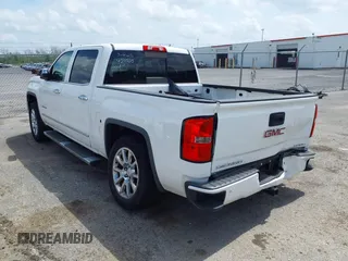 2014 GMC Sierra 1500 Denali z VIN 3GTP1WEC3EG421005, wystawiony jako IAAI lot #41936295 z przebiegiem 188 918 mil mil oraz . Historia ofert i sprzedaży dostępna na DreamBid. Obrazek 3.
