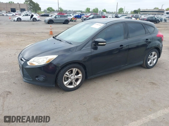 2013 Ford Focus SE with VIN 1FADP3K2XDL247582, listed as a IAAI auction lot 42083081 with 195,688 mi miles. Bid and sale history available at carsss.com. Image 2.