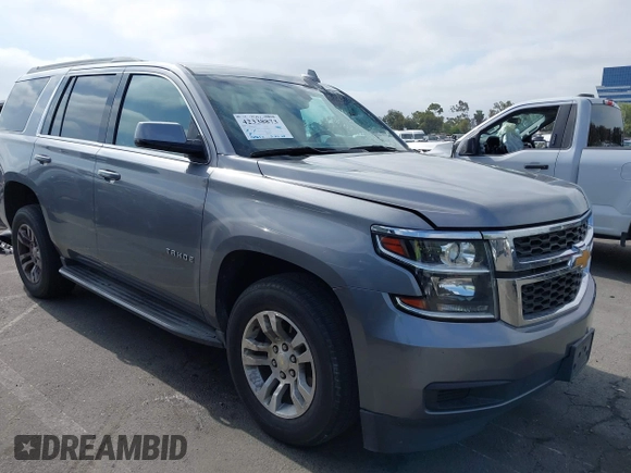 2018 Chevrolet Tahoe LS with VIN 1GNSCAEC2JR306131, listed as a IAAI auction lot 42338873 with 107,652 mi miles and . Bid and sale history available at DreamBid. Image 1.