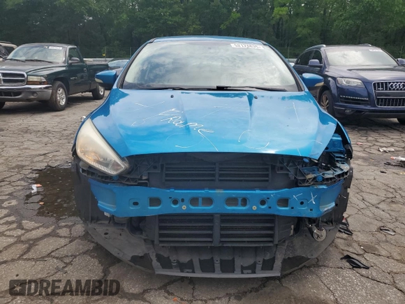 2016 Ford Focus SE z VIN 1FADP3F21GL400767, wystawiony jako Copart lot #52174835 z przebiegiem 141 264 mil mil oraz Szkoda całkowita • Salvage title. Historia ofert i sprzedaży dostępna na DreamBid. Obrazek 5.
