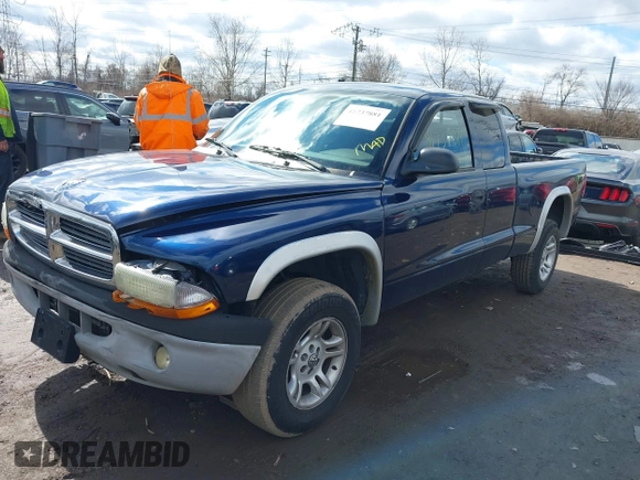 2004 Dodge Dakota SLT with VIN 1D7HG42N44S519910, listed as a IAAI auction lot 41737881 with 154,008 mi miles. Bid and sale history available at carsss.com. Image 17.
