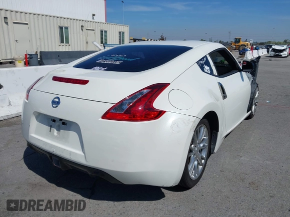 2018 Nissan 370Z Sport with VIN JN1AZ4EH3JM571169, listed as a IAAI auction lot 41859730 with 85,428 mi miles and . Bid and sale history available at DreamBid. Image 4.