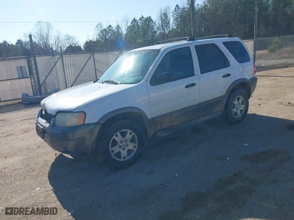 2004 Ford Escape XLT with VIN 1FMYU93174KA45992, listed as a IAAI auction lot 41169340 with 308,987 mi miles. Bid and sale history available at carsss.com. Image 2.