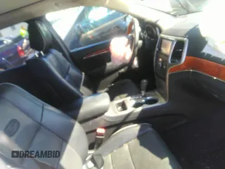 2011 Jeep Grand Cherokee Overland with VIN 1J4RS6GT2BC524217, listed as a IAAI auction lot 41827844 with 33,442 mi miles and . Bid and sale history available at DreamBid. Image 5.