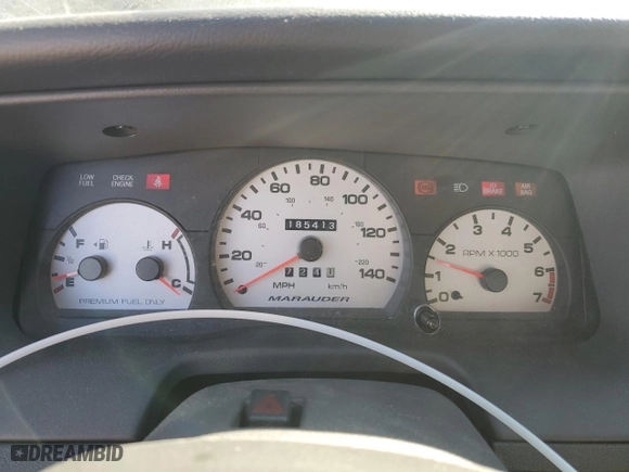 2003 Mercury Marauder with VIN 2MEHM75VX3X655842, listed as a Copart auction lot 74397554 with 185,413 mi miles and Salvage Title. Bid and sale history available at carsss.com. Image 9.
