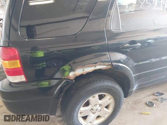2006 Ford Escape Limited z VIN 1FMYU94166KC22761, wystawiony jako IAAI lot #42853449 z przebiegiem 180 841 mil mil oraz . Historia ofert i sprzedaży dostępna na DreamBid. Obrazek 6.