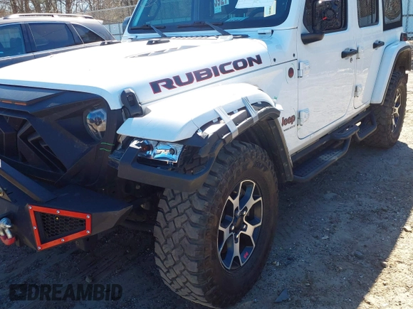 2023 Jeep Wrangler Rubicon with VIN 1C4HJXFG8PW655138, listed as a IAAI auction lot 41674959 with 40,790 mi miles and . Bid and sale history available at DreamBid. Image 6.