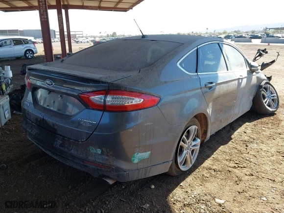 2015 Ford Fusion Energi Titanium with VIN 3FA6P0SU8FR245410, listed as a IAAI auction lot 41654373 with 1 mi miles. Bid and sale history available at carsss.com. Image 4.