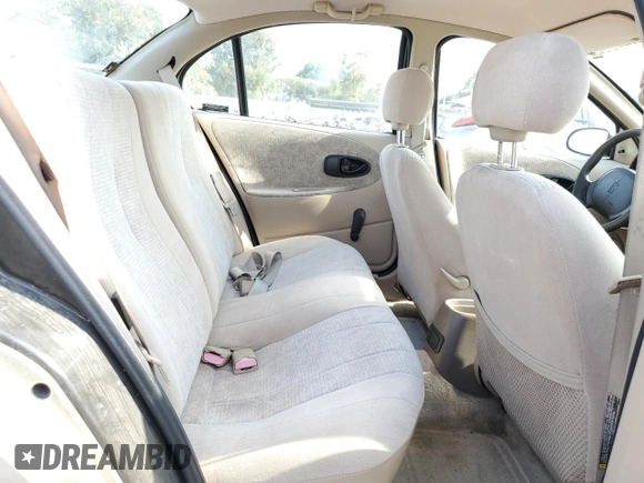 1999 Saturn SL with VIN 1G8ZK5275XZ262816, listed as a Copart auction lot 54144092 with 60,424 mi miles and Salvage title. Bid and sale history available at DreamBid. Image 6.