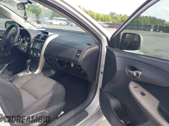 2013 Toyota Corolla L with VIN 5YFBU4EE7DP133536, listed as a IAAI auction lot 42067296 with 217,372 mi miles. Bid and sale history available at carsss.com. Image 5.