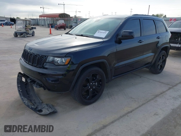 2018 Jeep Grand Cherokee Altitude with VIN 1C4RJFAG9JC436848, listed as a IAAI auction lot 42303459 with 124,044 mi miles and . Bid and sale history available at DreamBid. Image 17.