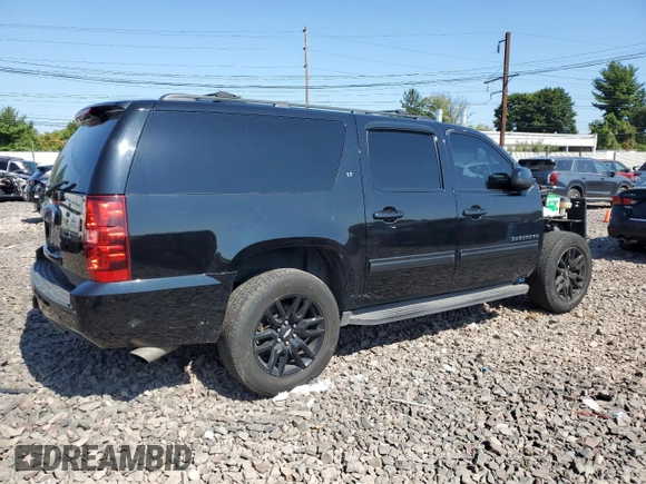 2014 Chevrolet Suburban LT with VIN 1GNSKJE72ER131763, listed as a Copart auction lot 69026754 with 186,248 mi miles and Salvage Title. Bid and sale history available at carsss.com. Image 3.