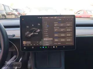 2022 Tesla Model Y Long Range with VIN 7SAYGDEE4NF522698, listed as a IAAI auction lot 41287885 with 82,306 mi miles. Bid and sale history available at carsss.com. Image 7.