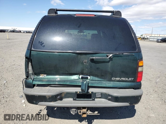 2004 Chevrolet Suburban LT with VIN 3GNFK16T24G168520, listed as a Copart auction lot 64969795 with 215,145 mi miles and Salvage title. Bid and sale history available at DreamBid. Image 6.
