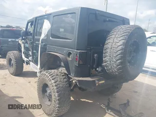 2014 Jeep Wrangler Unlimited Rubicon X with VIN 1C4HJWFG3EL274905, listed as a IAAI auction lot 41512631 with 123,961 mi miles and . Bid and sale history available at DreamBid. Image 3.