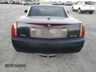 2004 Cadillac XLR z VIN 1G6YV34A445602565, wystawiony jako Copart lot #84011204 z przebiegiem Nie podano mil oraz Tytuł czysty. Historia ofert i sprzedaży dostępna na DreamBid. Obrazek 6.