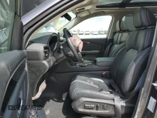 2024 Honda Pilot Touring z VIN 5FNYG1H74RB036990, wystawiony jako Copart lot #56254385 z przebiegiem Nie podano mil oraz Szkoda całkowita • Salvage title. Historia ofert i sprzedaży dostępna na DreamBid. Obrazek 7.