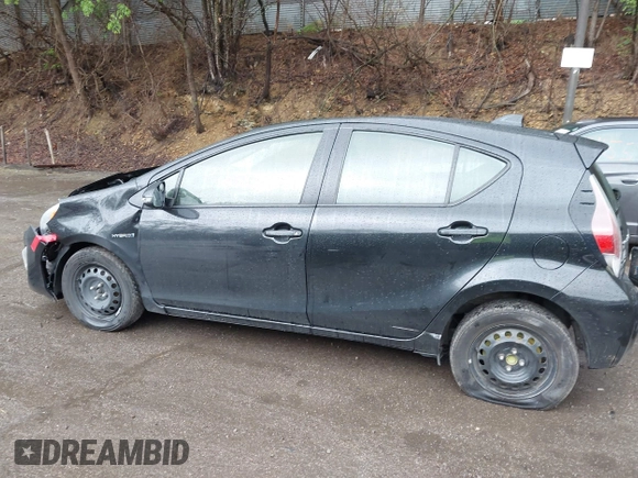 2015 Toyota Prius One z VIN JTDKDTB30F1101631, wystawiony jako IAAI lot #42331068 z przebiegiem 156 631 mil mil oraz . Historia ofert i sprzedaży dostępna na DreamBid. Obrazek 15.