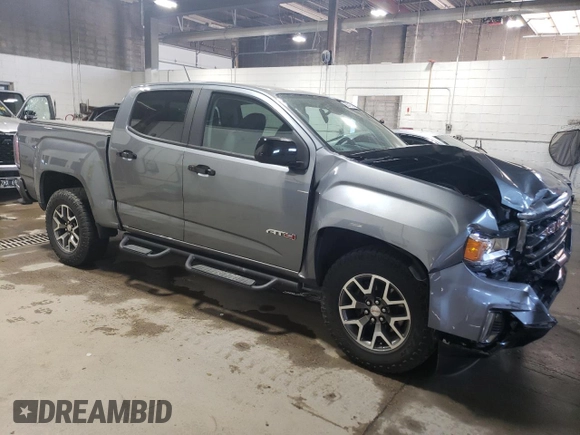 2021 GMC Canyon 4WD AT4 z VIN 1GTG6FEN1M1203936, wystawiony jako Copart lot #56041315 z przebiegiem 54 939 mil mil oraz Szkoda całkowita • Salvage title. Historia ofert i sprzedaży dostępna na DreamBid. Obrazek 4.