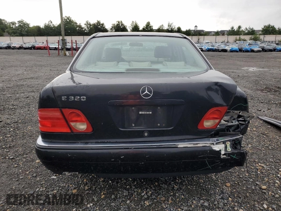 1999 Mercedes-Benz E-Class with VIN WDBJF65H9XA929577, listed as a Copart auction lot 71932364 with 84,806 mi miles and Salvage Title. Bid and sale history available at carsss.com. Image 6.