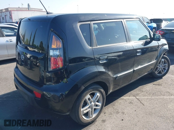 2010 Kia Soul + with VIN KNDJT2A26A7140621, listed as a IAAI auction lot 42001647 with 52,780 mi miles. Bid and sale history available at carsss.com. Image 4.