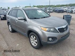 2011 Kia Sorento LX with VIN 5XYKTDA14BG141553, listed as a IAAI auction lot 42190896 with 212,690 mi miles and . Bid and sale history available at carsss.com. Image 1.
