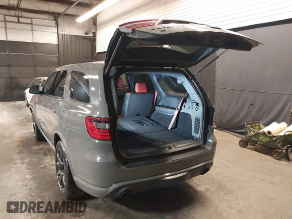 2023 Dodge Durango SRT Hellcat Premium with VIN 1C4SDJH9XPC655507, listed as a IAAI auction lot 42172418 with 1,490 mi miles and . Bid and sale history available at DreamBid. Image 3.