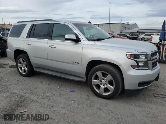 2015 Chevrolet Tahoe LT with VIN 1GNSCBKC2FR166597, listed as a Copart auction lot 50976505 with 155,069 mi miles and Salvage Title. Bid and sale history available at DreamBid. Image 4.