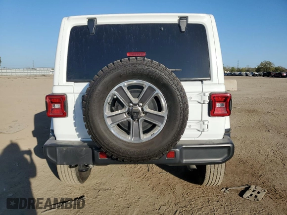 2020 Jeep Wrangler Unlimited Sahara Altitude with VIN 1C4HJXEG4LW314038, listed as a Copart auction lot 73728374 with 50,828 mi miles and Salvage title. Bid and sale history available at DreamBid. Image 6.