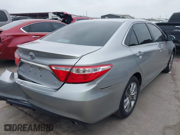 2015 Toyota Camry XLE with VIN 4T1BF1FK0FU960051, listed as a IAAI auction lot 42125452 with 117,047 mi miles and . Bid and sale history available at DreamBid. Image 4.