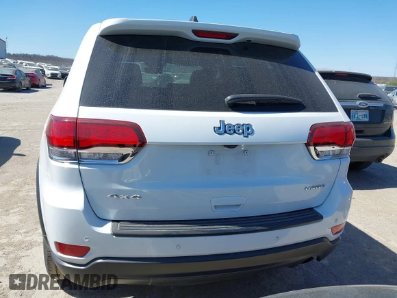 2021 Jeep Grand Cherokee Laredo E with VIN 1C4RJFAG5MC579865, listed as a IAAI auction lot 41818874 with 105,489 mi miles and . Bid and sale history available at DreamBid. Image 16.