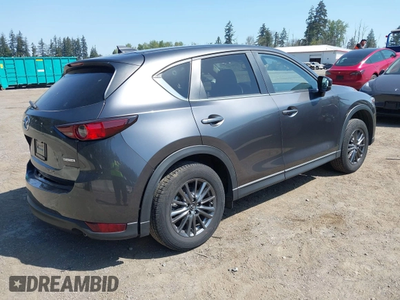 2020 Mazda CX-5 Touring with VIN JM3KFBCM6L1828691, listed as a IAAI auction lot 42100409 with 25,182 mi miles. Bid and sale history available at carsss.com. Image 4.