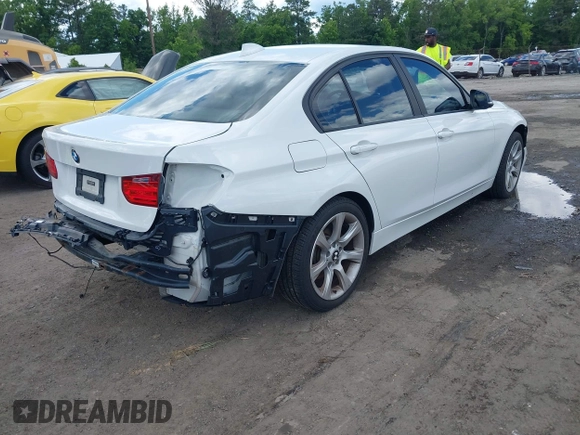2013 BMW 3 Series 335i xDrive with VIN WBA3B9C59DJ899358, listed as a IAAI auction lot 42321863 with 127,700 mi miles and . Bid and sale history available at DreamBid. Image 4.