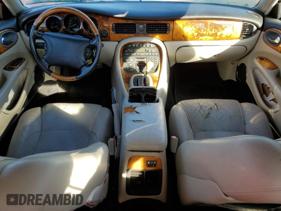 1999 Jaguar XJ with VIN SAJPX1849XC857869, listed as a Copart auction lot 83773914 with 172,496 mi miles and Clean title. Bid and sale history available at DreamBid. Image 8.