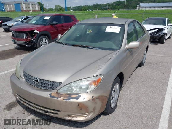 2003 Toyota Camry LE with VIN 4T1BE32K13U243738, listed as a IAAI auction lot 42120647 with Not Provided miles and . Bid and sale history available at DreamBid. Image 2.