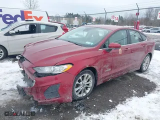2019 Ford Fusion Hybrid SE with VIN 3FA6P0LU4KR146334, listed as a IAAI auction lot 41720440 with 111,716 mi miles. Bid and sale history available at carsss.com. Image 18.
