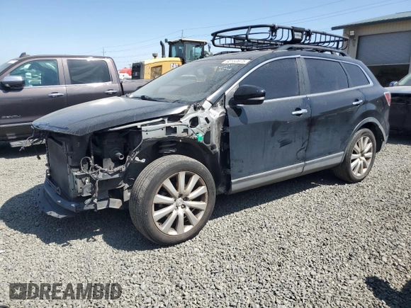 2010 Mazda CX-9 Grand Touring with VIN JM3TB3MV8A0235690, listed as a Copart auction lot 60153975 with 146,736 mi miles and Salvage title. Bid and sale history available at DreamBid. Image 1.