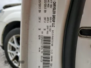 2014 Dodge Journey R/T with VIN 3C4PDDFG1ET176774, listed as a Copart auction lot 52140875 with 100,260 mi miles and Clean title. Bid and sale history available at DreamBid. Image 13.