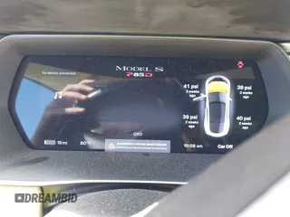 2015 Tesla Model S 85D with VIN 5YJSA1H48FF082038, listed as a IAAI auction lot 41712242 with 58,297 mi miles. Bid and sale history available at carsss.com. Image 7.