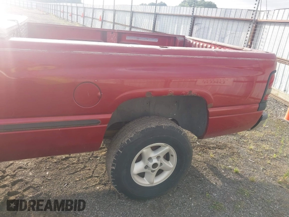 1999 Dodge 1500 z VIN 1B7HF16Y2XS185896, wystawiony jako IAAI lot #42251046 z przebiegiem 258 932 mil mil oraz . Historia ofert i sprzedaży dostępna na DreamBid. Obrazek 16.