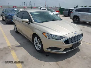 2018 Ford Fusion SE z VIN 3FA6P0H75JR176394, wystawiony jako IAAI lot #42169780 z przebiegiem 65 617 mil mil oraz . Historia ofert i sprzedaży dostępna na DreamBid. Obrazek 1.
