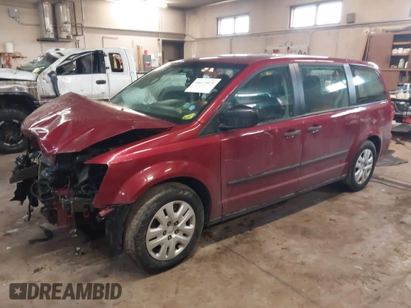 2014 Dodge Grand Caravan SE with VIN 2C4RDGBG5ER379315, listed as a IAAI auction lot 41673071 with 168,569 mi miles and . Bid and sale history available at DreamBid. Image 2.