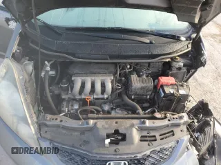 2013 Honda Fit с VIN JHMGE8H33DC067627, выставлен на аукционе Copart как лот 51168015 с пробегом 170 522 миль миль и Списание • Salvage title. История ставок и продаж доступна на DreamBid. Изображение 11.