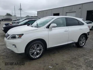 2014 Lexus RX 450h with VIN JTJZB1BA6E2009808, listed as a Copart auction lot 70686484 with 121,225 mi miles and Salvage title. Bid and sale history available at DreamBid. Image 1.