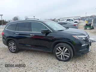 2017 Honda Pilot Touring with VIN 5FNYF6H90HB051700, listed as a IAAI auction lot 41902075 with 69,712 mi miles. Bid and sale history available at carsss.com. Image 14.