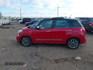 2014 FIAT 500L Lounge with VIN ZFBCFACH7EZ005169, listed as a IAAI auction lot 41250084 with 132,605 mi miles and . Bid and sale history available at DreamBid. Image 14.