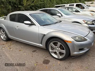2004 Mazda RX-8 with VIN JM1FE17N540130784, listed as a Copart auction lot 76628734 with 122,806 mi miles and Clean Title. Bid and sale history available at carsss.com. Image 1.