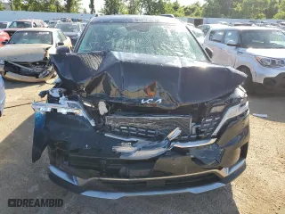 2023 Kia Carnival SX Prestige with VIN KNDNE5H39P6211336, listed as a Copart auction lot 57031024 with 22,961 mi miles and Salvage Title. Bid and sale history available at carsss.com. Image 5.