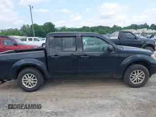 2015 Nissan Frontier S with VIN 1N6AD0EV2FN735908, listed as a IAAI auction lot 42388456 with 164,889 mi miles and . Bid and sale history available at DreamBid. Image 13.
